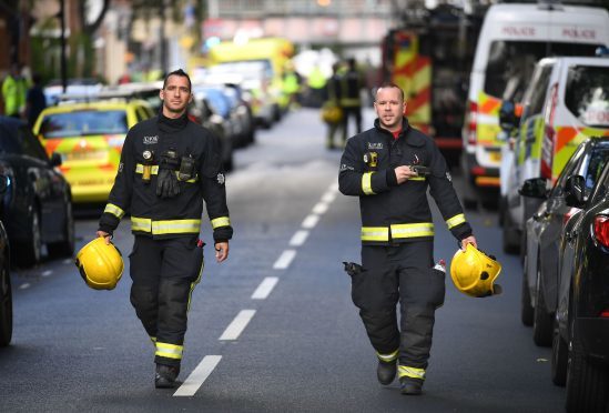 Emergency services outside Parsons Green station in west London after Scotland Yard declared a terrorist incident following a blast sent a "fireball" and a "wall of flame" through a packed London Underground train.