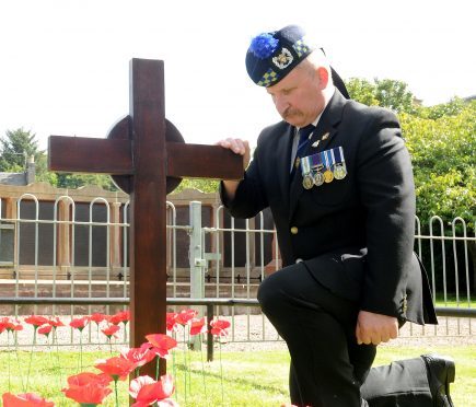 Paul Wilson, Inverness Branch Chairman with RBL Scotland at the newly unveiled cross in Cavelle Gardens, Inverness marking the 100th anniversary of the battle of Passchendaele. Picture by Sandy McCook.