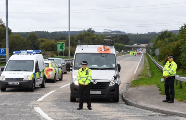 The southbound carriageway remains closed following a crash involving a van and a cyclist.