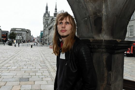 Taking part in the Silver City Stories is artist, Joe Stollery, pictured at the Castlegate, Aberdeen. 
Picture by Jim Irvine  27-6-17