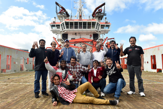The crew of the Malaviya Seven celebrate being able to sell the vessel in September