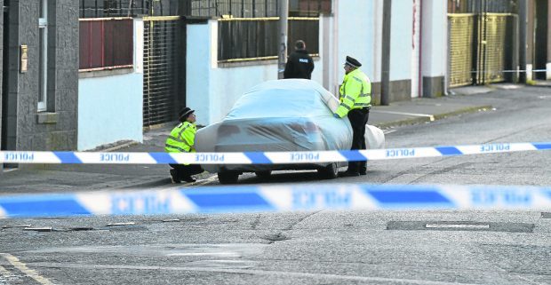 Police at the scene in Torry yesterday