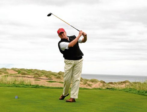 Donald Trump visiting the site of his golf course on  Aberdeenshire's coast in 2009.