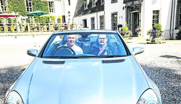 Stephen Morrison, who has multiple sclerosis and a passion for cars, was taken out for a drive in a Mercedes by Bryan Forman of local business Newmachar Motors.