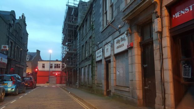 The former John Trail business in Fraserburgh has been boarded up since 2009.