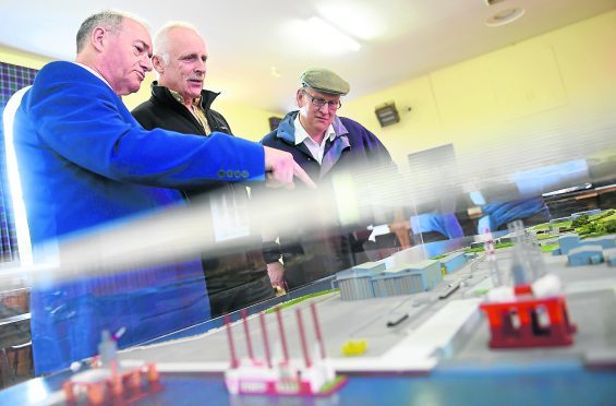 (L-R) Steve Chisholm, Operations Director with Global, David Macdonald Chairman of Tain Community Council and Highland Councillor Derek Louden.