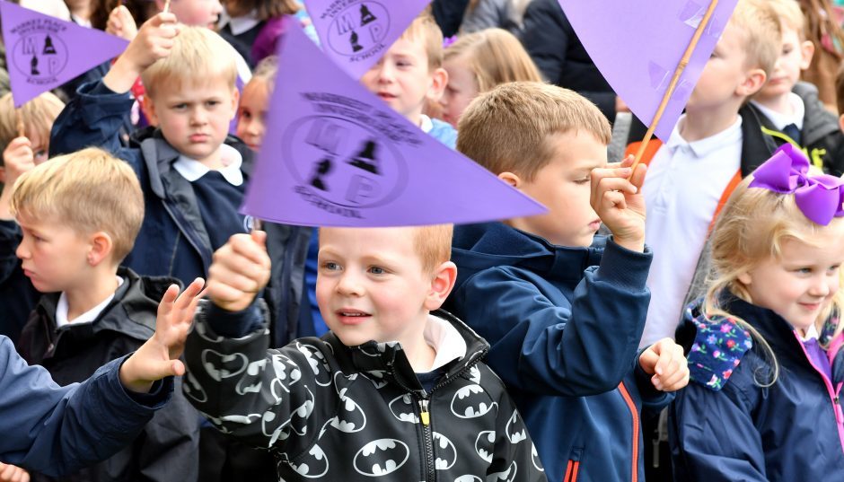 Afternoon ceremony to mark the closure of Market Place School, Inverurie, with pipers, singing in the Market Square and the final ring of the school bell.    
Pictures and video by Kami Thomson