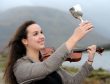 Royal National Mod, Fort William 2017 Claire Frances NicNill of Lochaber with the MacCallum Memorial Trophy for Fiddle playing. Pictures and video by Sandy McCook.