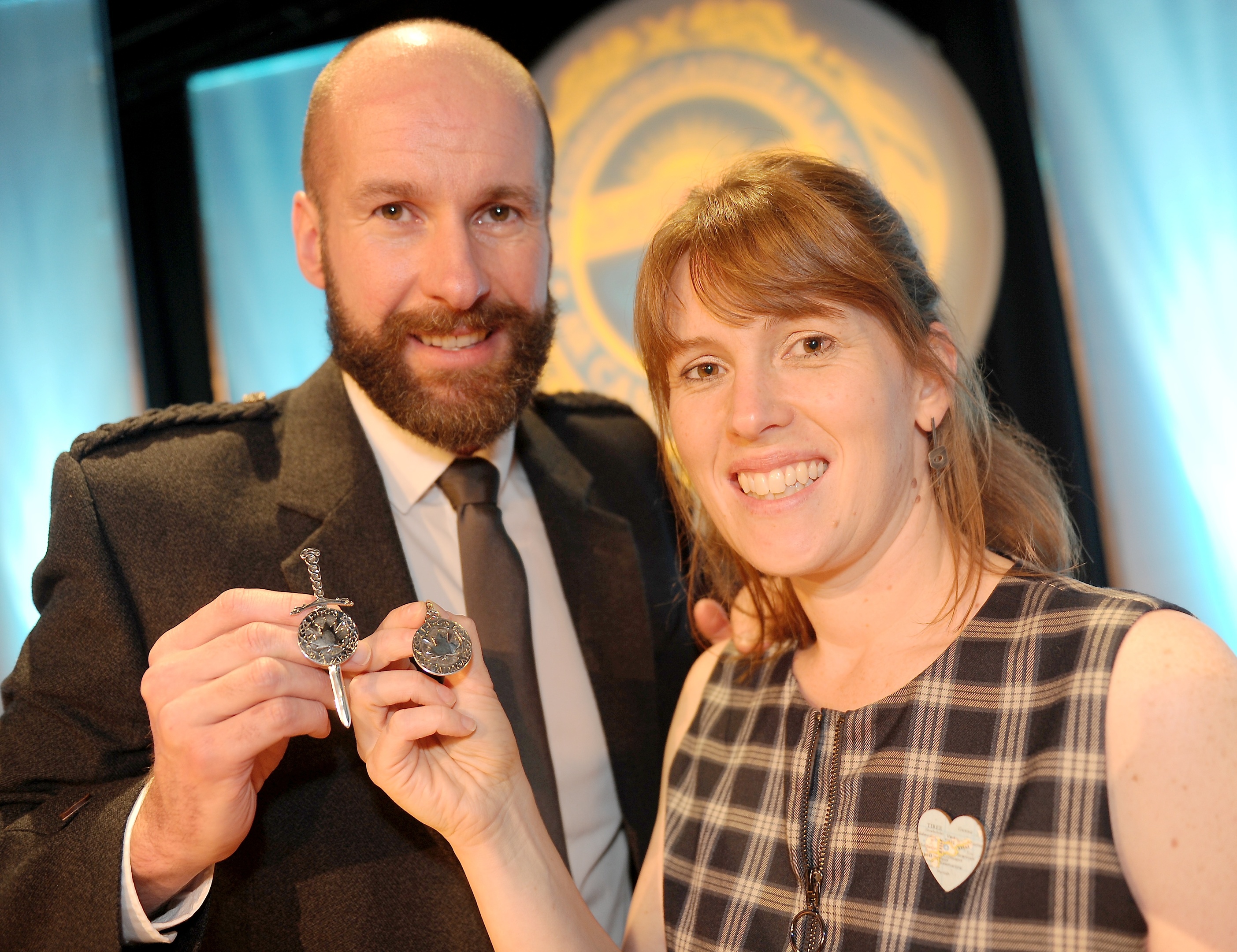Silver Pendant winners Coinneach MacLeod of Glasgow and Ishbel Campbell of Tiree with their respective awards. Picture by Sandy McCook.