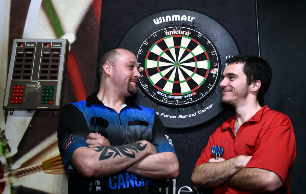Dave “The Magpie” Matthew (left) and Lewis “The Hitman” Grant are hoping to break the Guinness world Record for longest darts marathon playing singles
