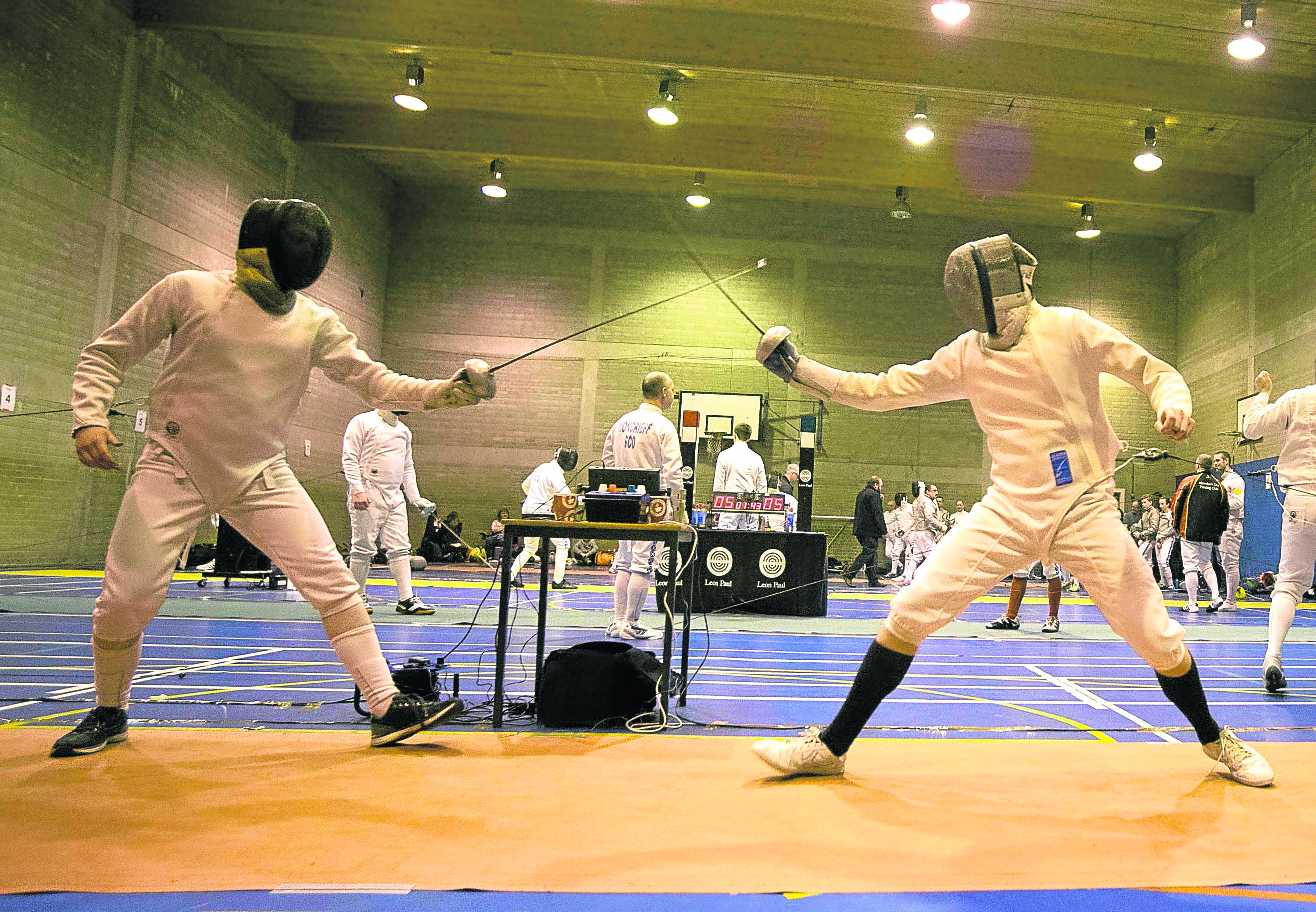 In photo on the left Kevin Linklater and Ruaridh Colclough taking part in the mens Epee
Epee
