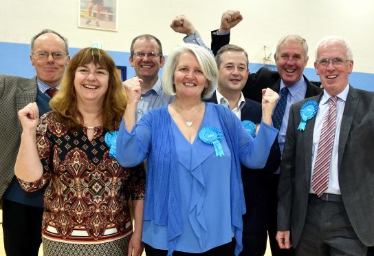 Winner of the Scottish Conservative & Unionist candidate for the 2017 Inverurie & District by-election Lesley Berry (in blue) surrounded by supporters.
Picture by COLIN RENNIE    October 13, 2017.