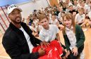 Footballer Shay Logan with Kai Muirhead and Sophie Seston (right).  
Pictures by Kami Thomson.