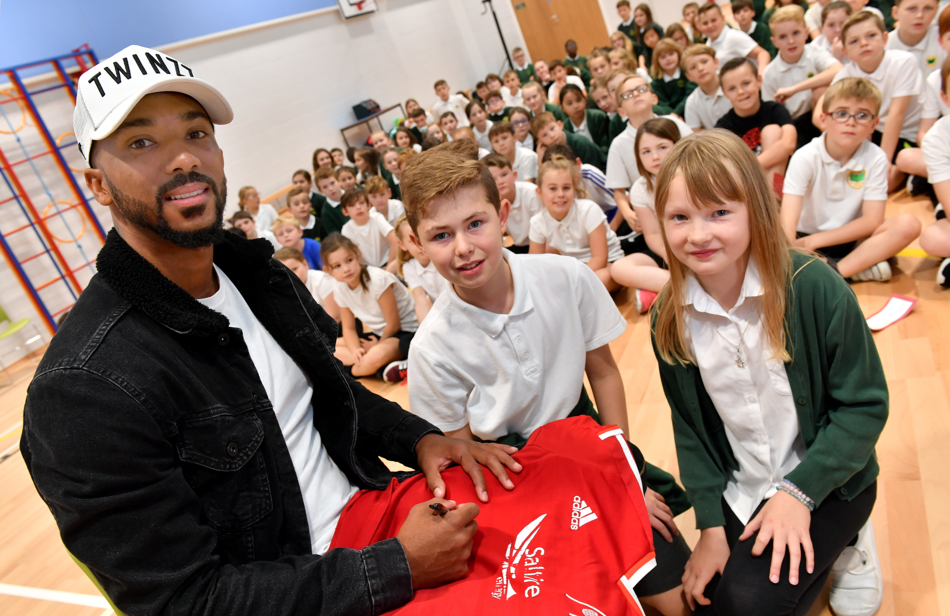 Footballer Shay Logan with Kai Muirhead and Sophie Seston (right).  
Pictures by Kami Thomson.