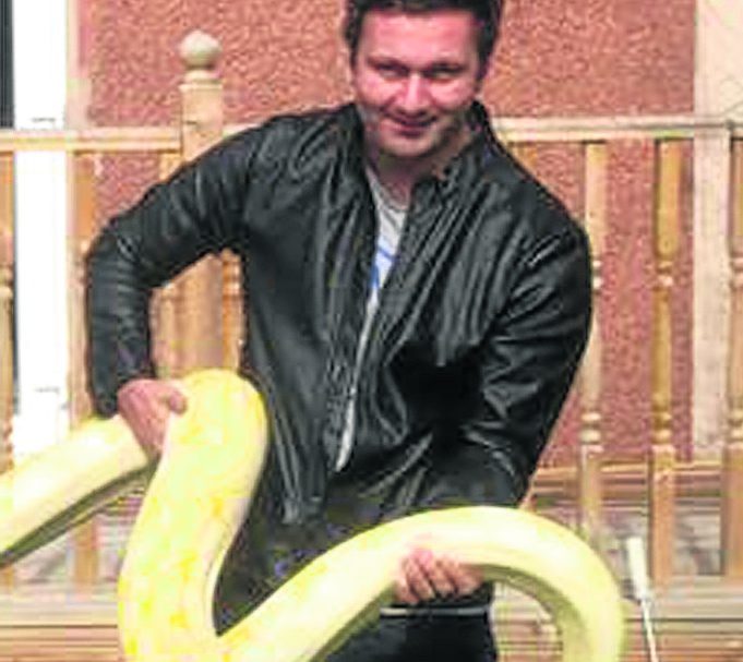 Tom McPherson with a snake