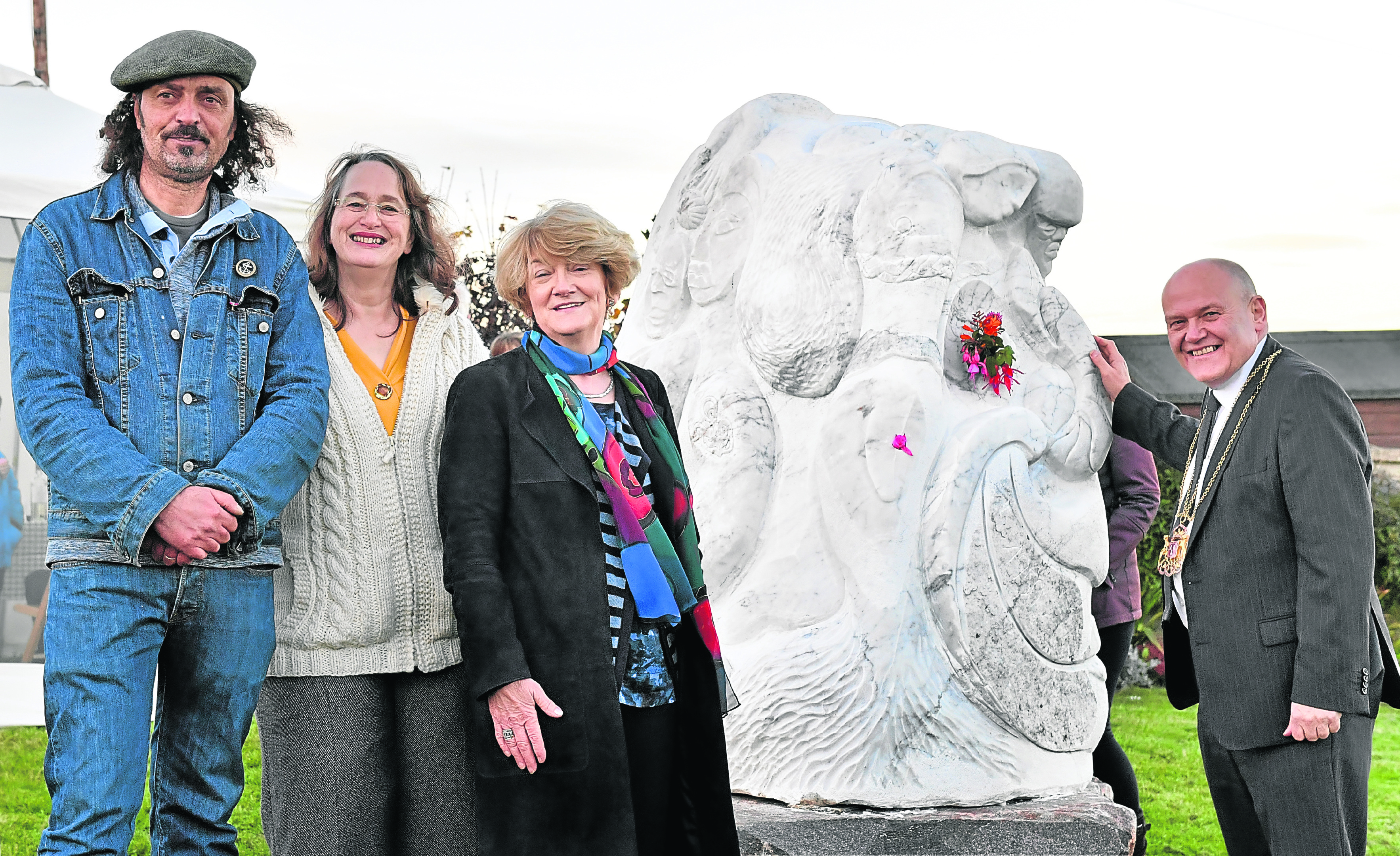 Pictured -  L-R Artist Albertino Costa, Wendy Suttar of Cove in Bloom, Christina MacSween, Isie Caie's granddaughter who unveiled the sculpture and Lord Provost Barney Crocket.    
Picture by Kami Thomson