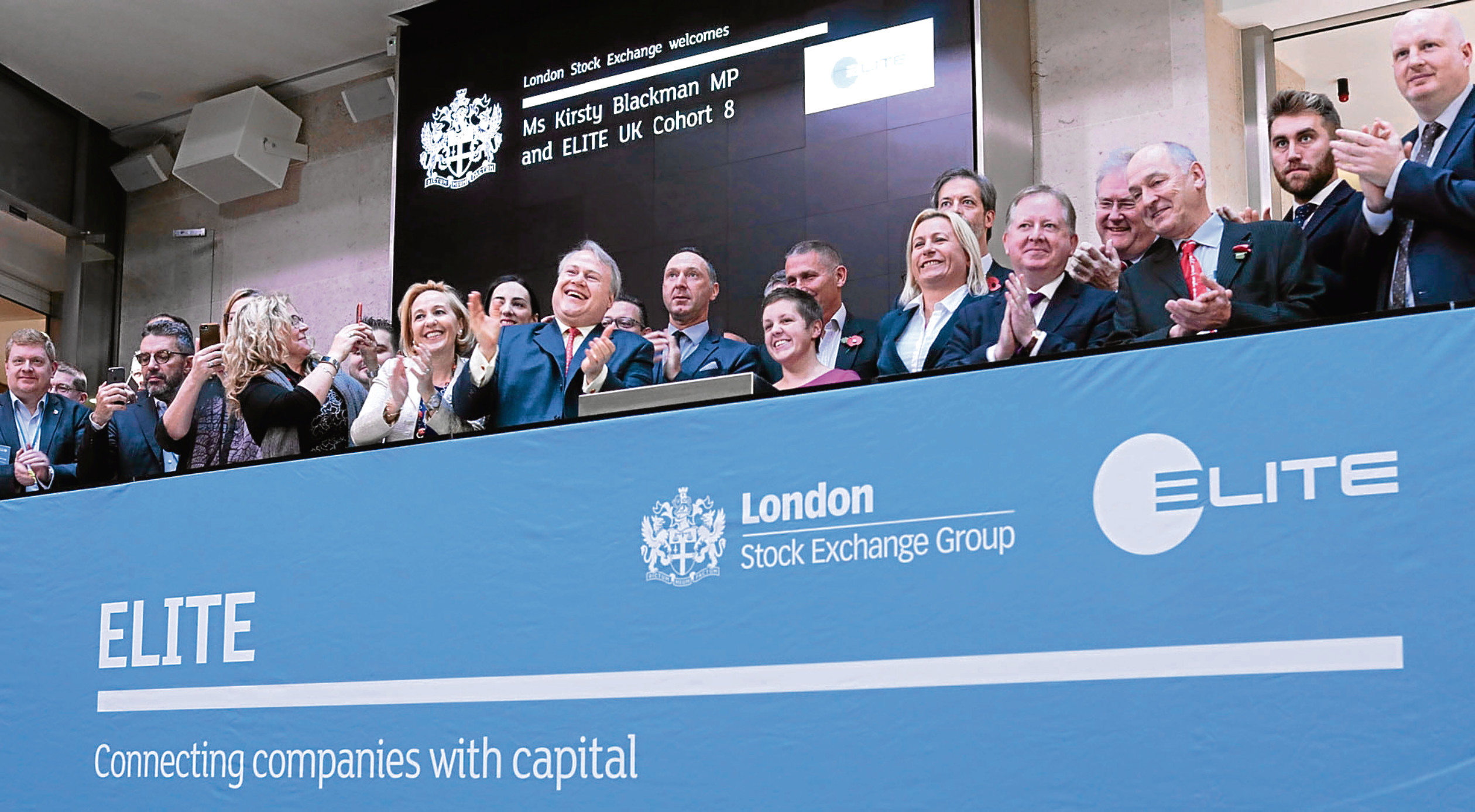 Scottish SNP MP Kirsty Blackman and new UK Elite chief executives open the London Stock Exchange
