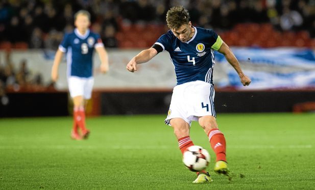 Kieran Tierney in action for Scotland