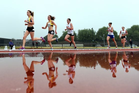 Scottish Athletics National Senior Championships and Parallel Success - No 141 Mhairi Maclennan and 23 Ellie Buchan compete in the woman's 5000m at Aberdeen Sports Village. 
Picture by KEVIN EMSLIE