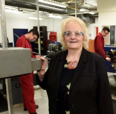 ITCA managing director, June Jones, with engineering apprentices working at their training facility in Kirkhill Industrial Estate, Dyce.