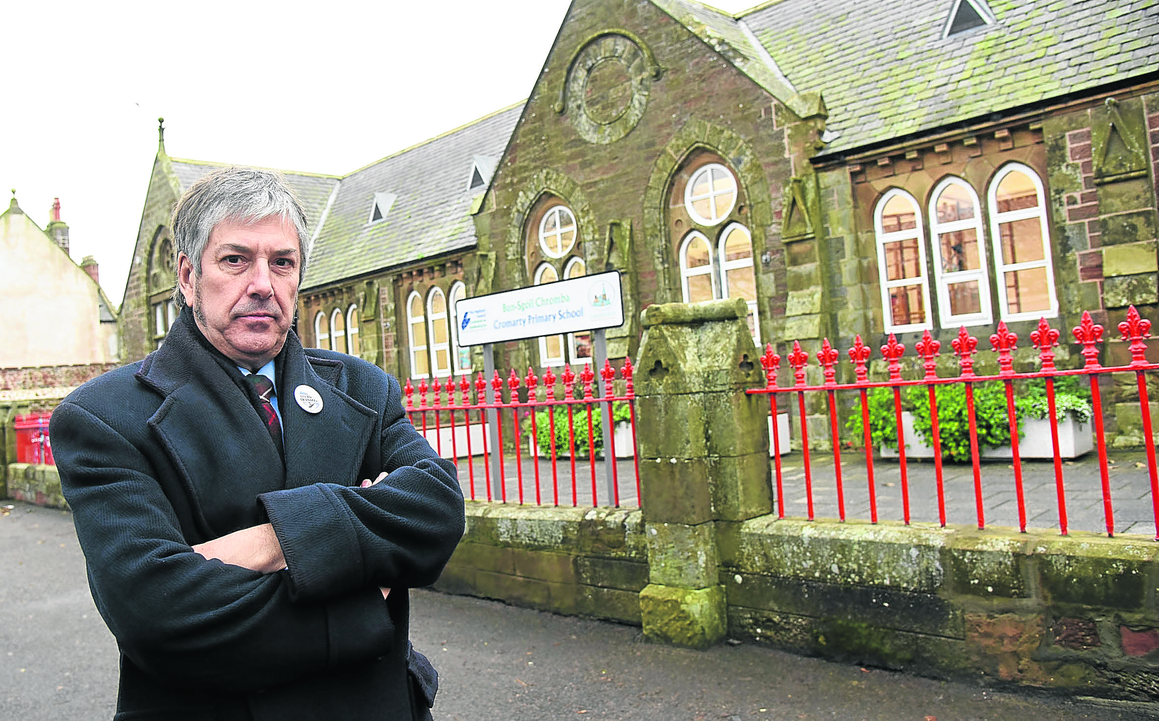 Councillor Craig Fraser outside Cromarty Primary School.