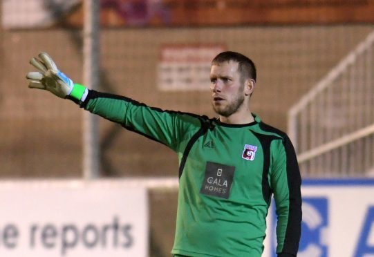 Locos' goalie Andy Reid