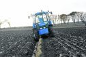 Gavin Robertson, Barrock driving a New Holland 7740 tractor with a 2 furrow reversible Keverneland  plough on his way to scooping the Champion of the field at the annual North and West Caithness Ploughing Association match held at Stanstill Farm Bower.