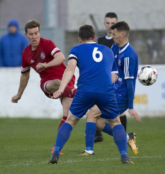 Martin Maclean fires Brora in to the lead.