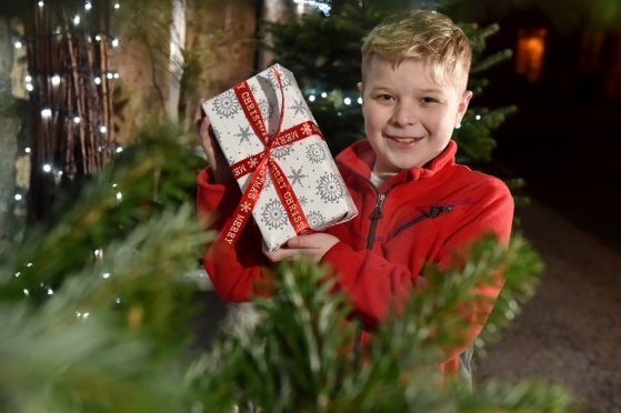 Caleb Middleton, 12, is asking his friends and family to donate to Friends of ANCHOR this year instead of giving him Christmas presents. Picture by Kenny Elrick.