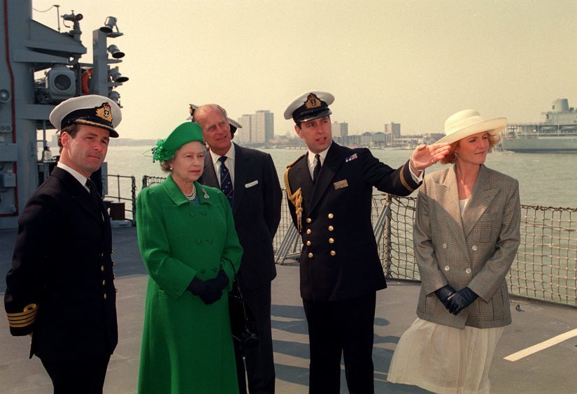 Queen Elizabeth II and the Duke of Edinburgh with the Duke and Duchess of York on board HMS Campbeltown at Portsmouth Harbour. April 1991.
