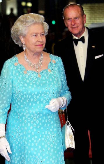 Queen Elizabeth II and the Duke of Edinburgh arrive for the Royal Variety Performance, at the Dominion Theatre in London. November 2001
