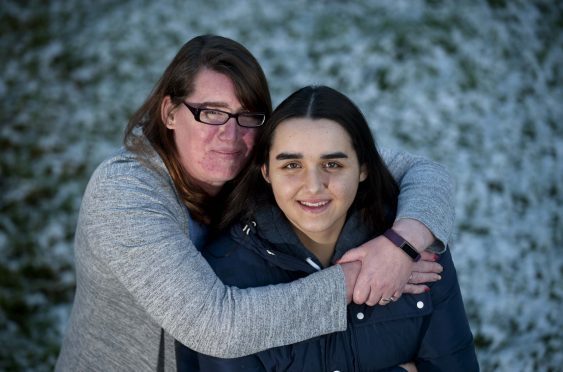 Millie with mum Ruth Howard.