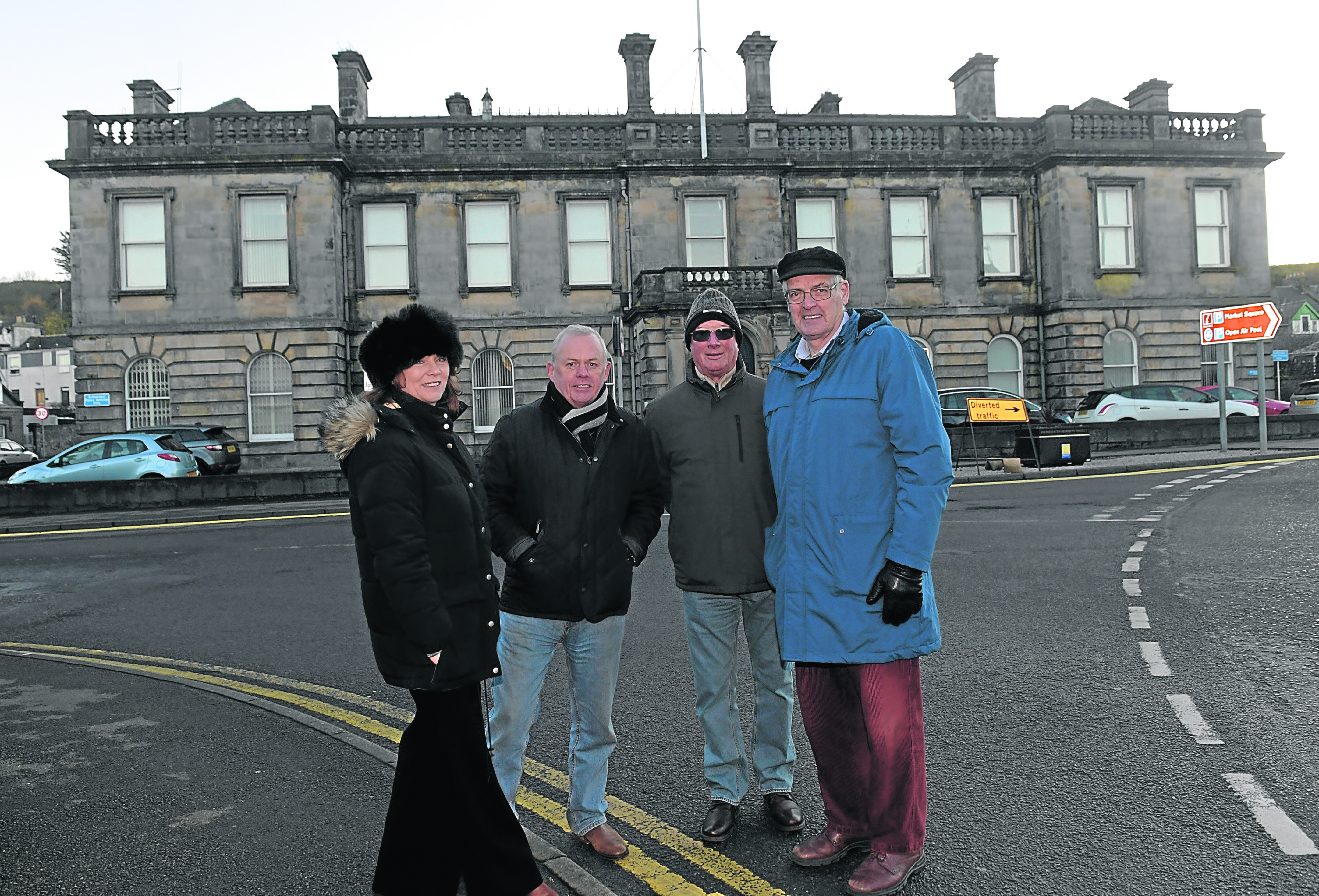 From left, Isabell Munn, Jim Douglas, John Robson and David Fleming are pictured at the old courthouse in Stonehaven, which is being bought by the community partnership.