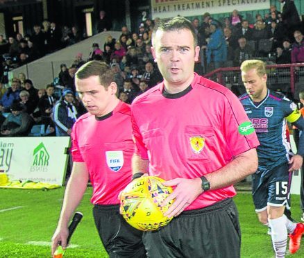 Referee Ben Dempster (centre) with Douglas Ross (left)