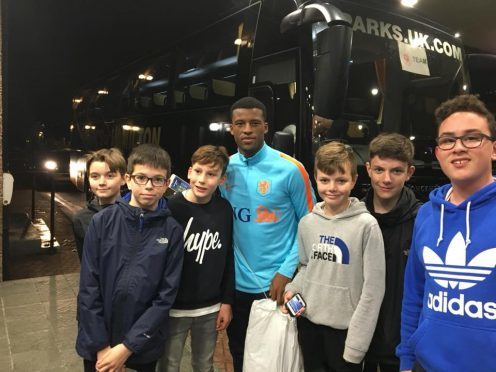 Liverpool star Gini Wijnaldum takes time out to meet fans in Dyce. Photo credit: Mike Cowling