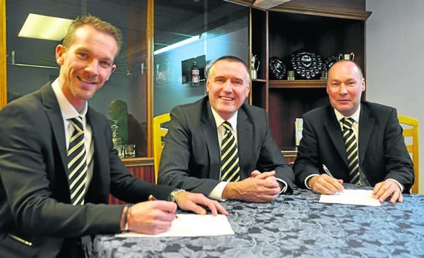 Huntly chairman George Clark, centre, with previous co-managers Andy Roddie and Tommy Wilson.