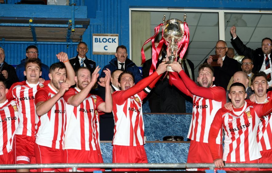 Formartine celebrate with the cup.
