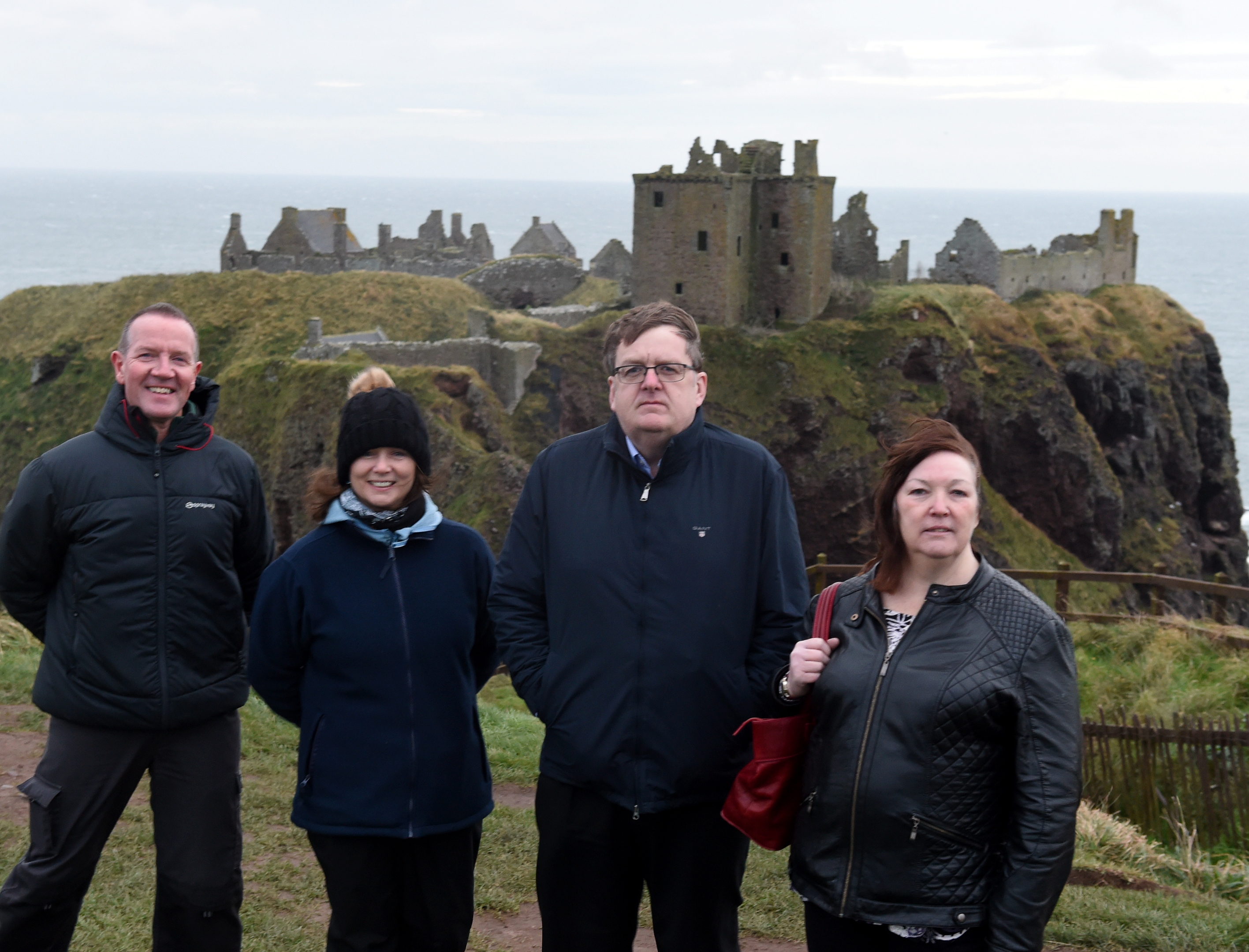 Stonehaven residents angry that they have not been included in NE250 list. In the picture at Dunnottar castle are from left: Jim Wands, cusodian of castle, Isabel Munn, Stonehaven town partnership, Simon Cruickshank, Ship Inn and Sheila Howarth, Belvedere Hotel. 
Picture by Jim Irvine  8-11-17