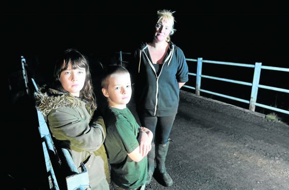 Jacqui McKinnon of Strathconon with her two children, Dreyden (9) and Deesha (10). Picture by Sandy McCook