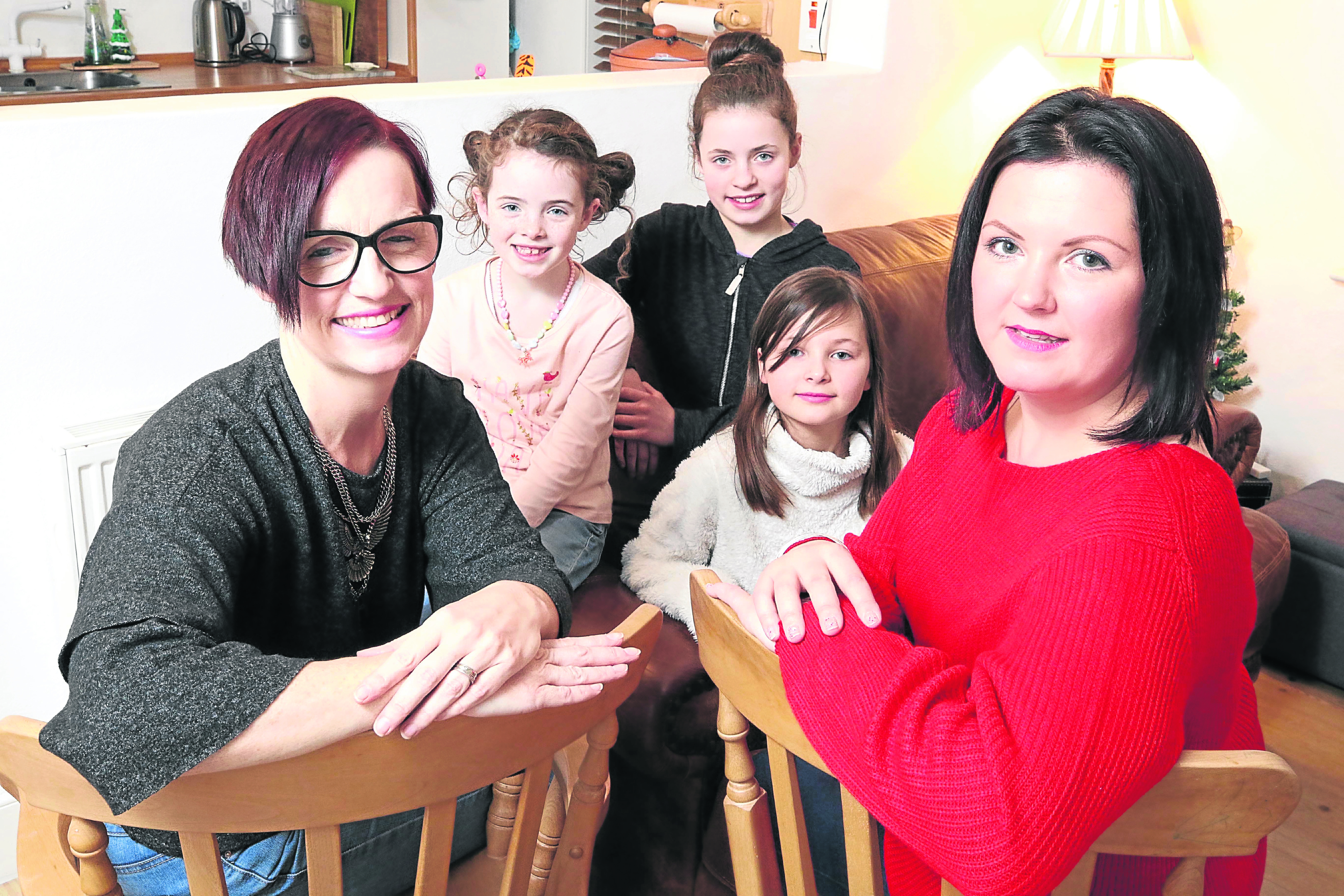 Morven Mackenzie-Fleming with her daughters Mara (7) and Ruby (11), and Diane Hendry with her daughter Samantha (10).