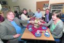 Some of the Befriending Caithness volunteers enjoy their Christmas party in Telford House, Wick