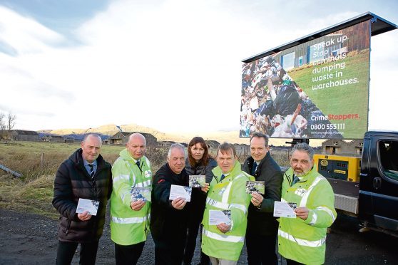 Pictured (left-to-right):  Jim Scott, Scottish Business Resilience Centre; Iain Wright, Enforcement and Interventions Specialist, SEPA; Alan Faulds, Watch Commander, Scottish Fire & Rescue Service; Angela Parker, National Manager, Crimestoppers Scotland; Terry AHearn, Chief Executive, SEPA; Willie Clark, Community Engagement Officer, Neighbourhood Watch Scotland; Archie Rowatt, Enforcement and Interventions Specialist, SEPA