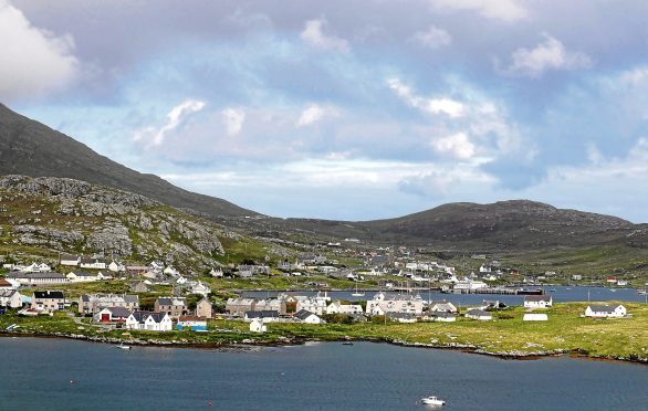 File photo dated 05/06/17 of a general view of Castlebay in Barra, as two divers have died after getting into difficulty in waters off the coast of the island in the Outer Hebrides. PRESS ASSOCIATION Photo. Issue date: Sunday July 30, 2017. A ferry skipper raised the alarm with Stornoway Coastguard when he noticed a small unmanned boat off Castlebay, Barra, at around 11.20am on Saturday. The coastguard helicopter and rescue teams were sent to the scene and the divers were found by Barra lifeboat crew at around 1pm. They both died at the scene. See PA story POLICE Divers. Photo credit should read: Andrew Milligan/PA Wire