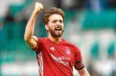 Aberdeen captain Graeme Shinnie is back in the squad after suspension.