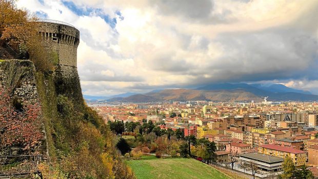 Brescia's hilltop castle overlooks the city and distant hills. Copyright Amy Laughinghouse.