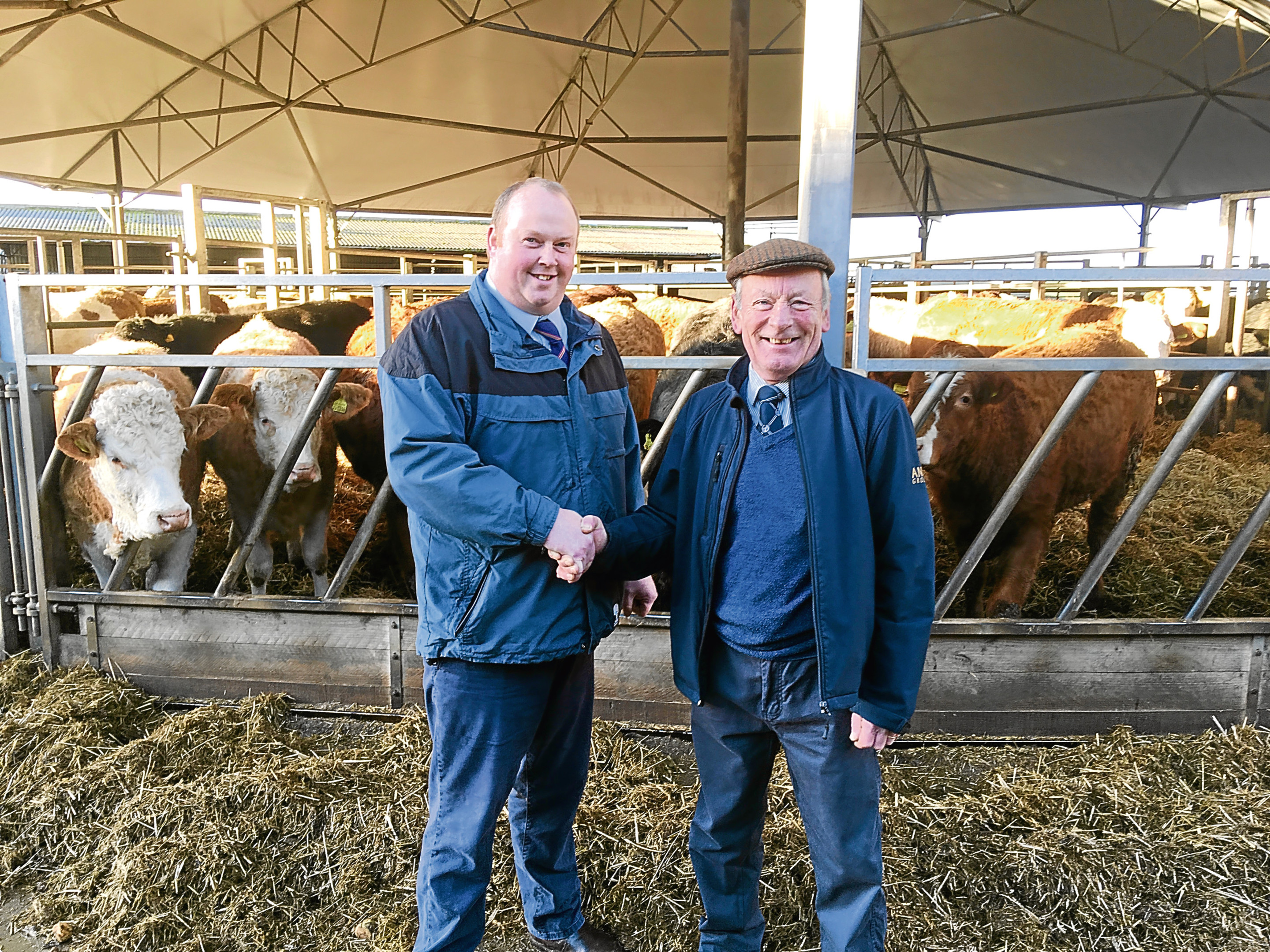 Marc MacIntosh and Charlie Morrison from ANM at the Morrison family farm at Fairburn, Longmanhill