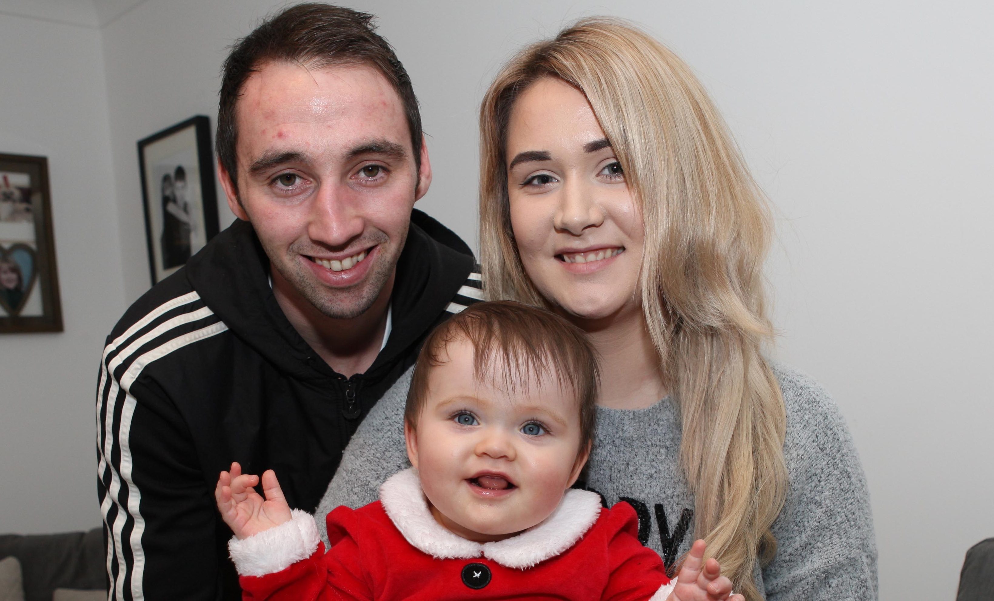 Kayleigh Bisset and Kevin Mackinnon with their daughter Emelia