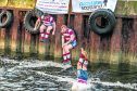 Lee Adams, Ross Joy and Stu Middleton of Moray Rugby Club take the plunge