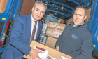 Richard Lochhead, left, with Fraser maclean who manages a busy menzies distribution depot