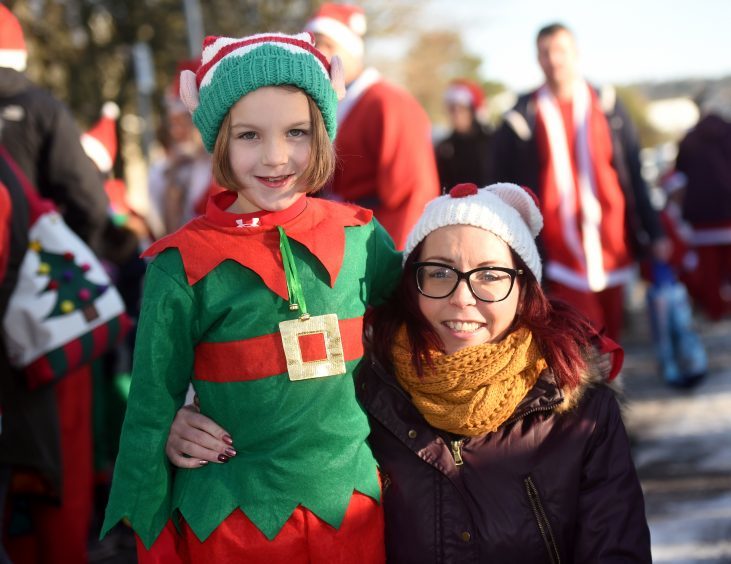 Inverurie Elf and Santa Run. Pictured are Suzanne Lovie and daughter Kendra, 8 from Macduff. Picture by Heather Fowlie.